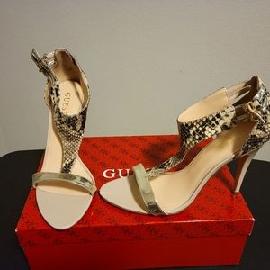 Guess, 9.5 tan w/ snake print 4" heels.